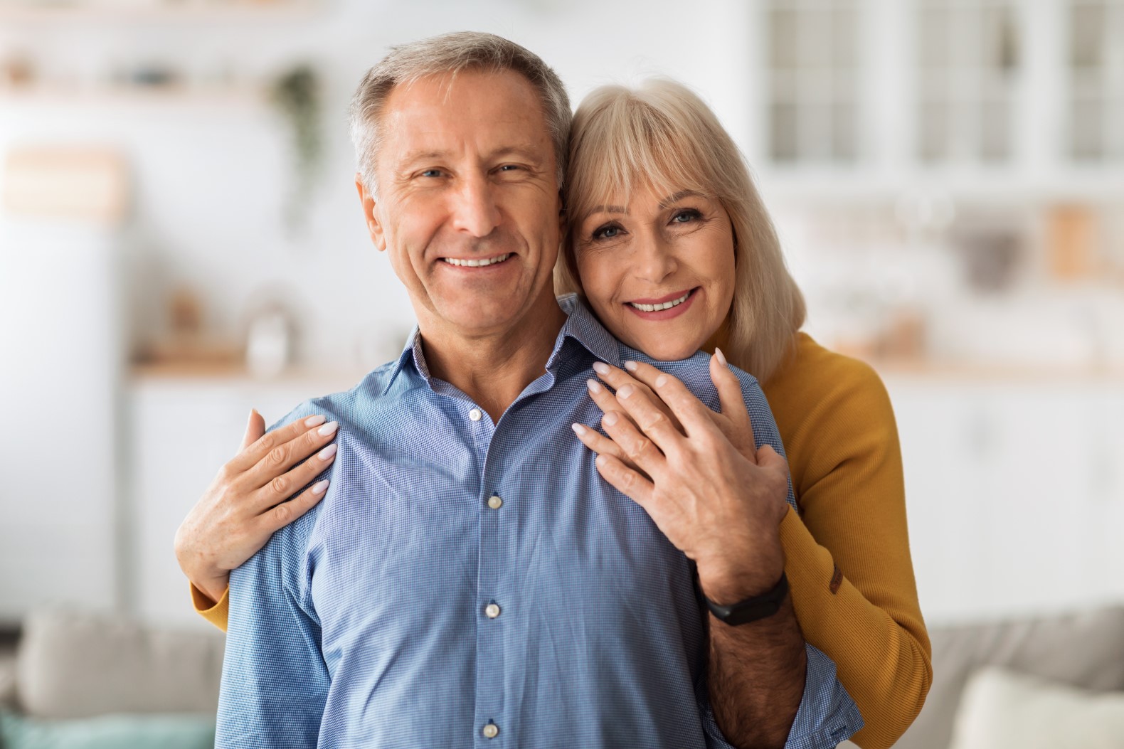 Senior Wife Embracing Husband